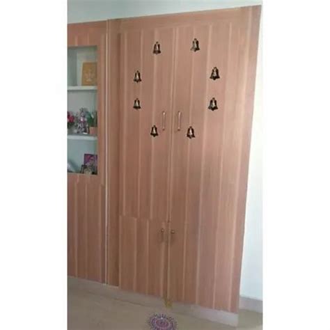 Double Door Wooden Designer Pooja Cupboard Features Termite Proof At