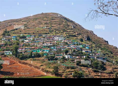 View Of Houses Built On The Mountainous Landscape And Terrace Farming