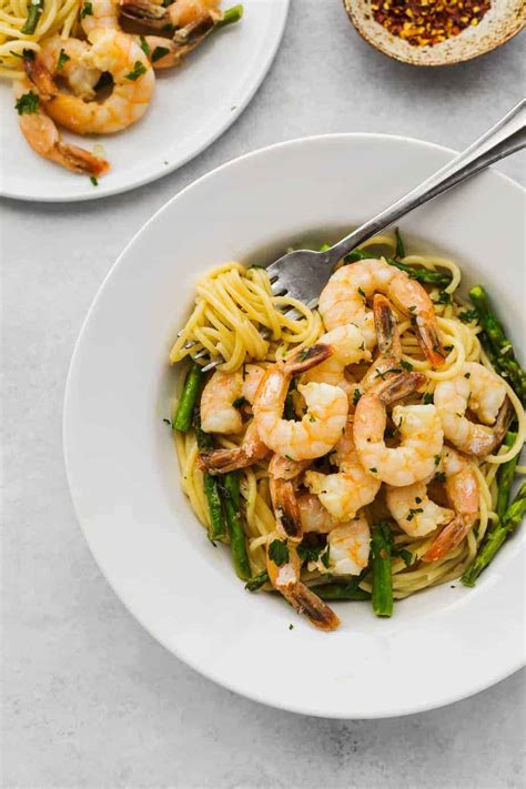 Get the recipe from delish. Garlic Butter Shrimp Scampi Pasta with Asparagus | Posh Journal