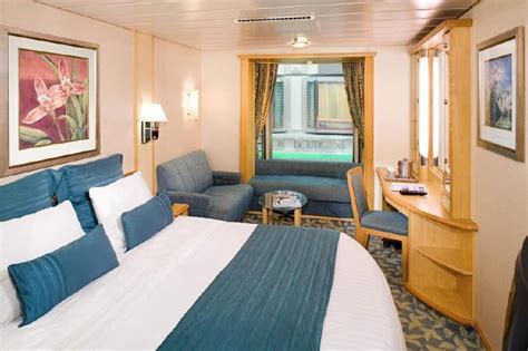 Side view of a cruise ship with cabins balconies. 9 Awesome Cruise Ship Inside Cabins
