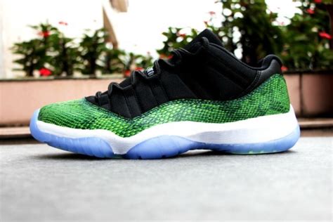 An added texture to the clean look. Snakeskin Returns to the Air Jordan 11 Low "Green Snake ...