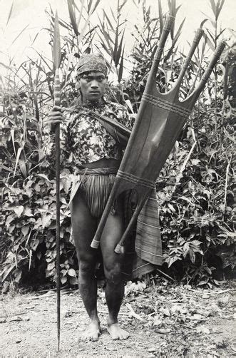 602795 A Kalinga Warrior Stands With His Spear And Shield Filipino