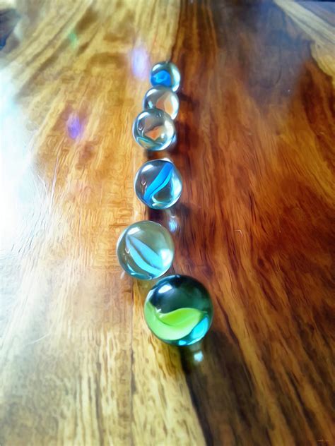 Pretty Marbles All In A Row Photograph By Isabella F Abbie Shores