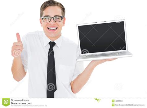 Geeky Businessman Holding His Laptop Showing Thumbs Up Stock Photo