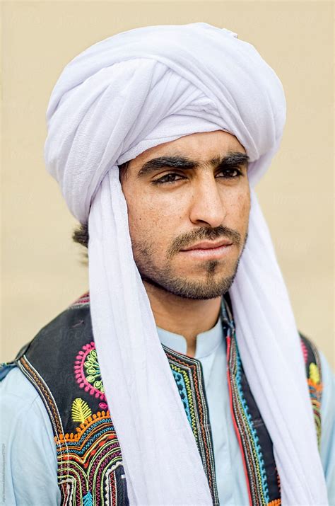 A Tribal Man In White Turban And Waistcoat By Stocksy Contributor