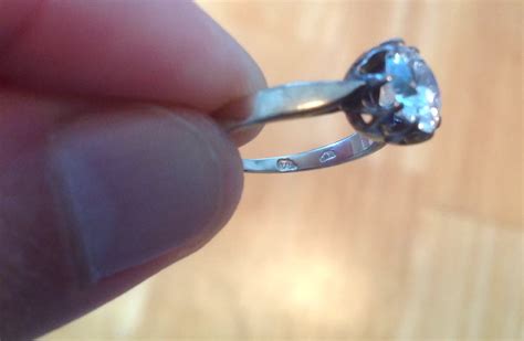 Need Help Identifying Marks On White Gold Ring 925