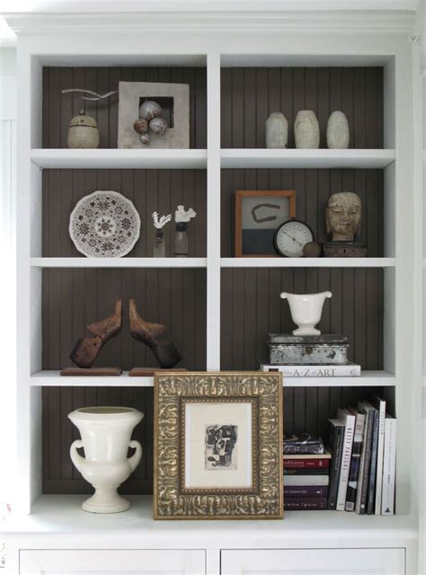 If your kitchen has plenty of cabinetry but not a ton of available wall space for art, install a ledge. Flashback | Bookcase decor, Bookcase diy, Bookshelf decor