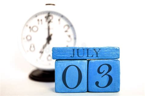 July 3rd Day 3 Of Month Handmade Wood Calendar And Alarm Clock On