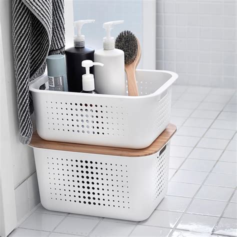 Storage baskets and bins are not only practical but have in recent years become a popular interior detail, for the living room, bedroom and bathroom. White Nordic Storage Baskets with Handles | The Container ...