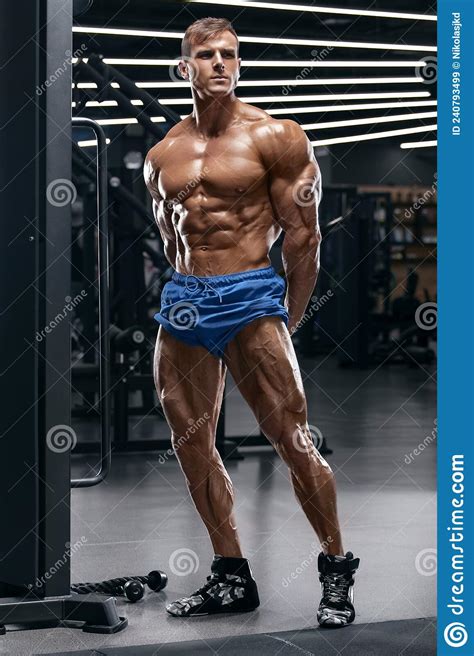 Muscular Man In Gym Showing Muscles Working Out Strong Male Naked