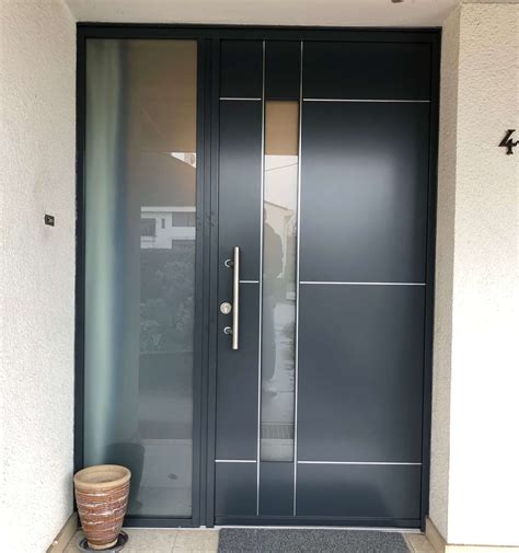 Moderne et design, nos produits sont une porte d'entrée, ce n'est pas seulement un lieu de passage entre l'extérieur et l'intérieur de votre logement. Portes d'entrée bois BEL'M - Menuiserie Alu, PVC, Bois