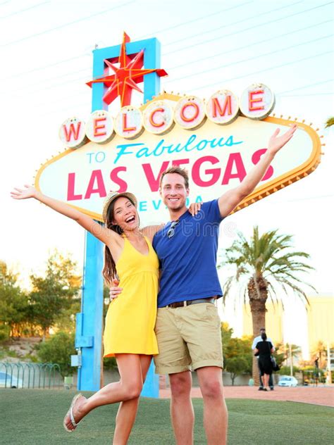 Las Vegas Sign Couple Jumping Having Fun Stock Image Image 32730493