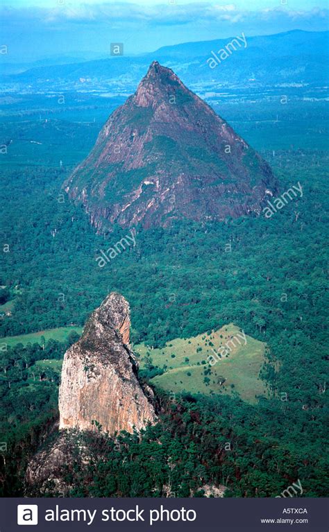 The question is often put, are the glasshouse mountains the remnants of old volcanoes? the short answer is no, as they are magma intrusions that were. Glass House Mountains Stock Photo: 3717833 - Alamy
