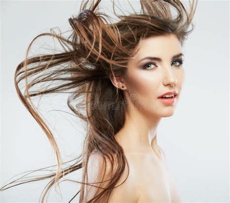 Woman Face With Hair Motion On White Background Isolated Stock Photo