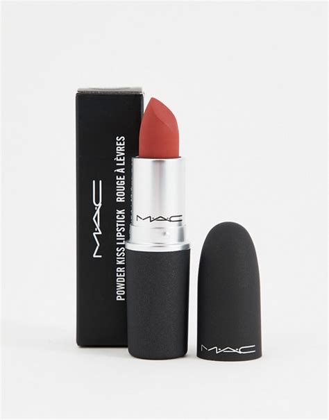 A rich lipstick that features high color payoff in a creamy matte finish. MAC Powder Kiss Lipstick - Devoted To Chili | ASOS