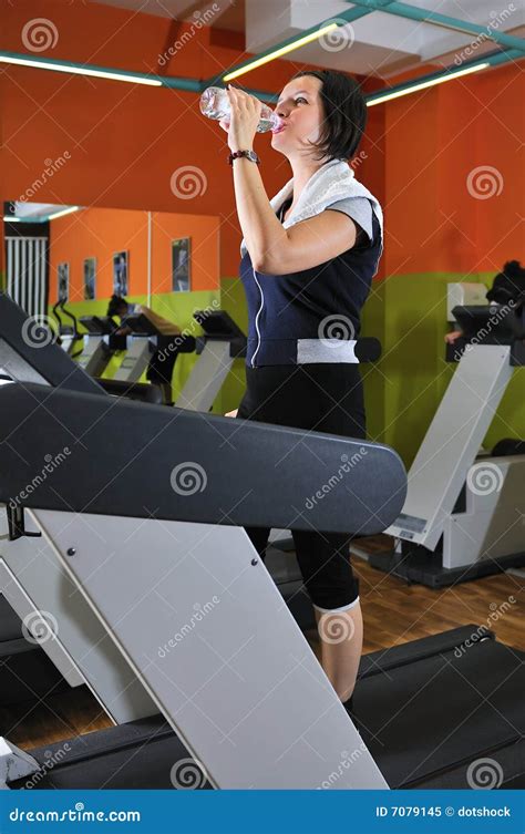 Young Woman Drinking Water While Working Out Stock Image Image Of