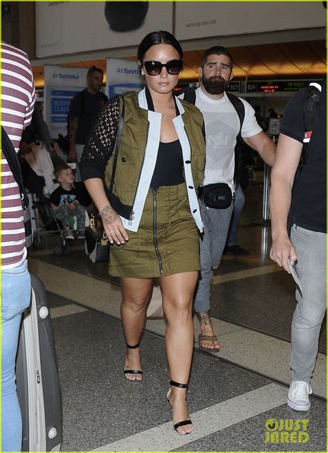Demi Lovato Flaunts Chic Olive Green Ensemble At Lax Airport Photo
