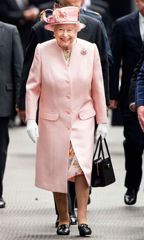 Queen Elizabeth Ii Takes A Cue From Kate Middleton In Recycled Dress Us Weekly