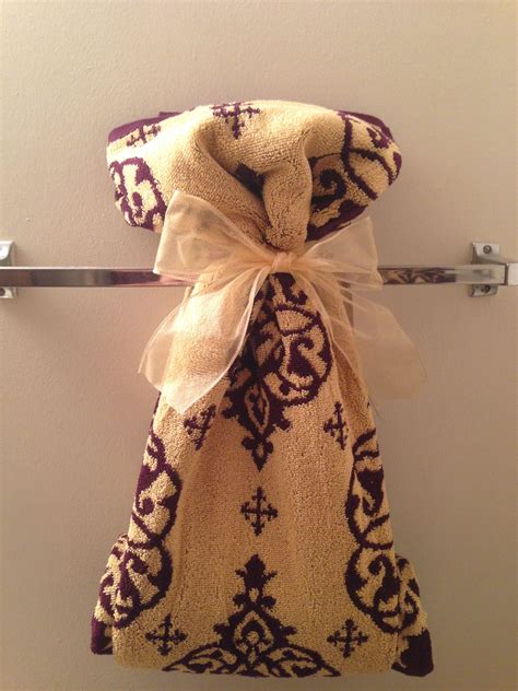You may frequent hotels that treat your towels like your toilet paper, but some upscale hotels actually take pride in their towel presentation, therefore borrow some skills from master origami artists and apply them to folding towels and washcloths for memorable and decorative affect. Decorative towel | Decorative towels, Decorative bath ...