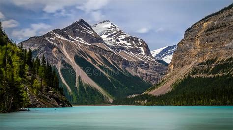 The Silky Looking Turquoise Water Of Kinney Lake In Robson Provincial