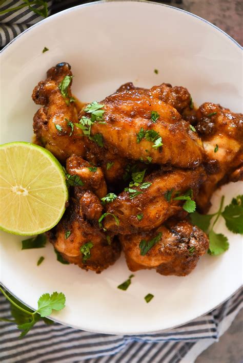 This baking at a low temperature dries the wings out and allows the baking powder to penetrate. Honey Chipotle Crispy Baked Wings