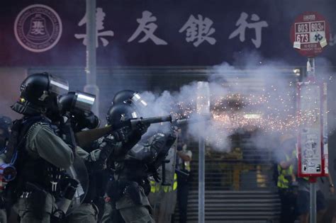 Hong Kong Police Break Out The Tear Gas Early Sending Protesters Scrambling Wsj