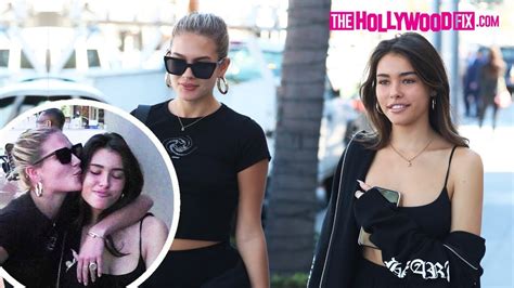 madison beer and isabella jones share a playful kiss while leaving lunch at croft alley 10 21 19