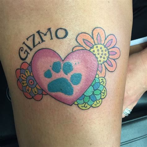 This tattoo looks really, very beautiful. 90+ Best Paw Print Tattoo Meanings and Designs - Nice ...