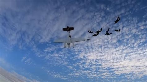 Terrifying Moment Plane Narrowly Misses Skydivers As It Plummets