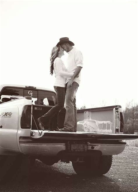 Country Love Kissing On The Back Of A Truck Couple Pictu Cute