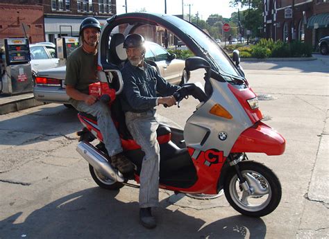 The idea with the c1 was to make driving a scooter more like a car by avoiding the need for a helmet. bmw c1 scooter | The BMW C1 which was only made between ...