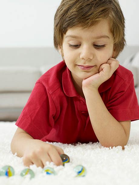 Kids Playing Marbles Stock Photos Pictures And Royalty Free Images Istock