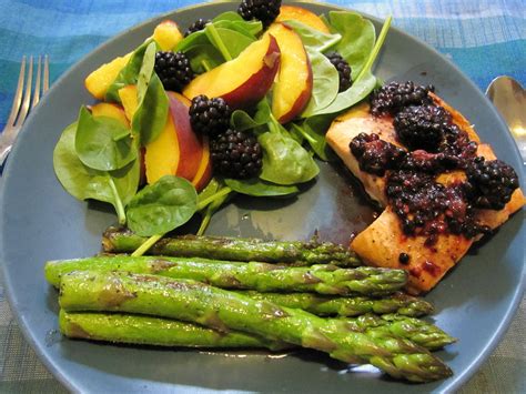 Serve this baked salmon asparagus with a squeeze of lemon for extra vitamin c and a side of hollandaise sauce for healthy fats. Kitchen Musings: Spinach, Asparagus & Salmon with Blackberry Glaze