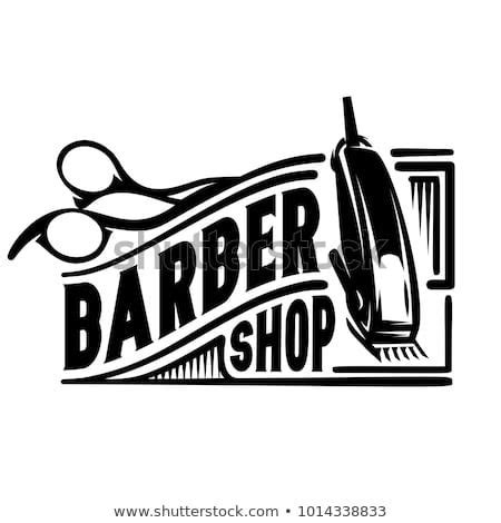 Barber shop or hairdresser shop, hand holds scissors, logo design. Discover this and millions of other royalty-free stock ...