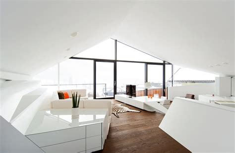 Slope Roof House With Futuristic Interiors