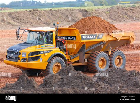 Articulated dump trucks at work on the construction of Doncaster's