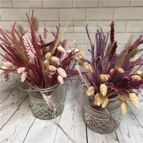 Arrangements including lilies are always a winner. Dried flower vase