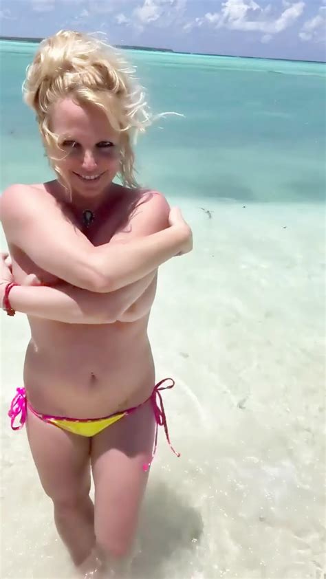 Britney Spears Flashes Her Nude Tits As She Poses Topless On The Beach Enhanced Pics Video