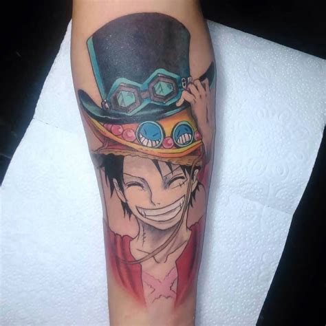 One Piece Tattoo Luffy With Ace And Sabos Hats One Piece Tattoos Pieces Tattoo Tattoos