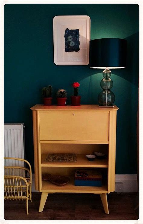 Take one of the cabinet doors to the paint department of the home improvement store and ask them to select paint/stains and other finishes and application tools that will work for your kitchen. Annie Sloane chalk paint - English yellow retro cabinet. | Retro cabinet, Home decor, Decor