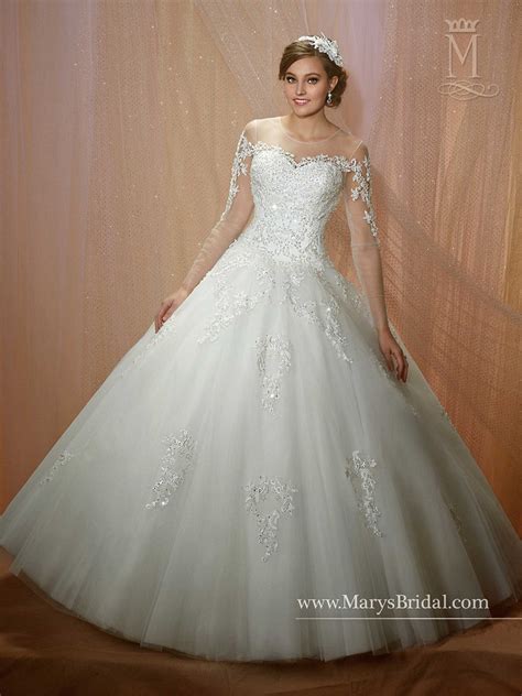 Wedding photo of two flower girls princess gowns lace half sleeve dresses with tiara on. Marys Bridal Couture D Amour 6462 Wedding Dress
