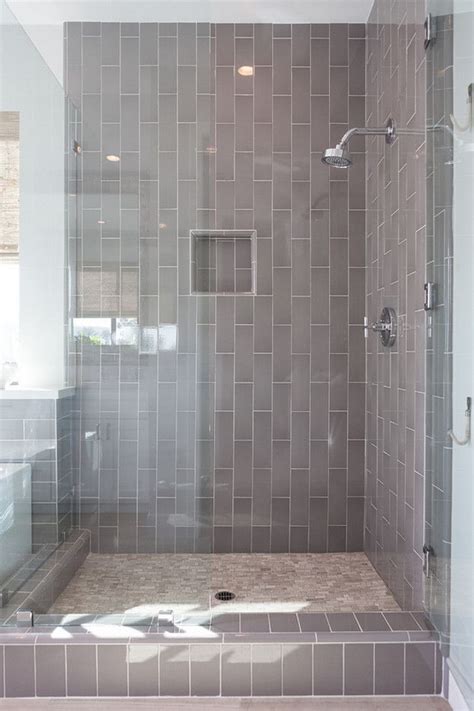 Next up is the hipper, younger sister to the staggered brick—the. Gray shower tile, Bathroom shower tile, Bathroom design