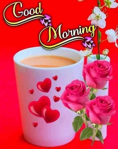 A Cup Of Coffee With Pink Roses In It And The Words Good Morning On Top