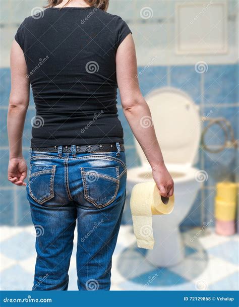 Man Suffers From Diarrhea Is Sitting On Toilet Bowl Royalty Free Stock