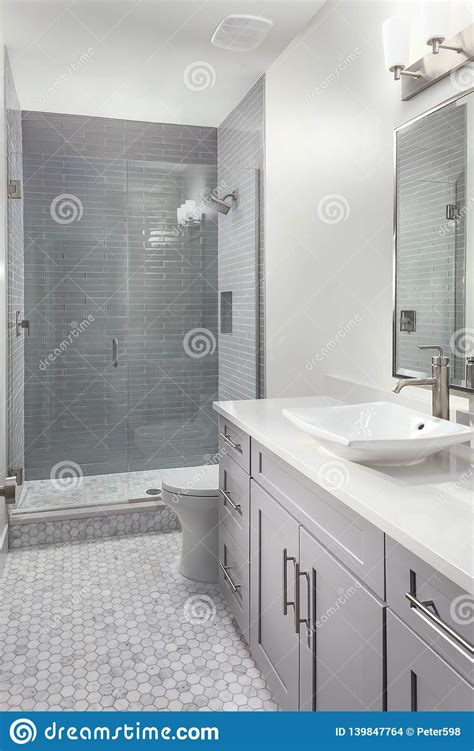 Nothing beats a good shower. Modern And Elegant Bathroom With High End Fixtures Stock ...