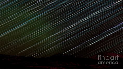 Star Trails In Sky Over Dark Yukon Taiga Landscape Photograph By