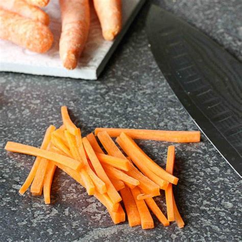 Set aside for the juices and flavors to release from the carrots. Cookin' Canuck | How to: Julienne a Carrot (Matchstick Style)