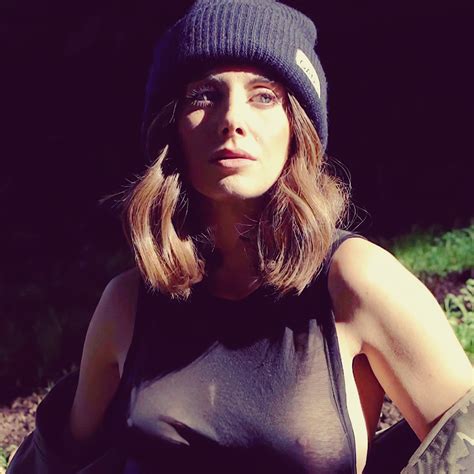 Alison Brie Poses Braless Showing Her Boobs In A See Through Top For