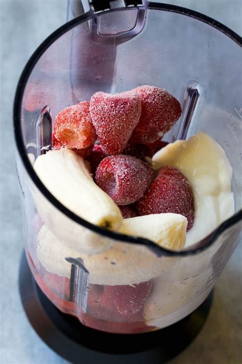 Frozen Strawberries Apple Juice Banana And Yogurt In A Blender Strawberry Banana Smoothie