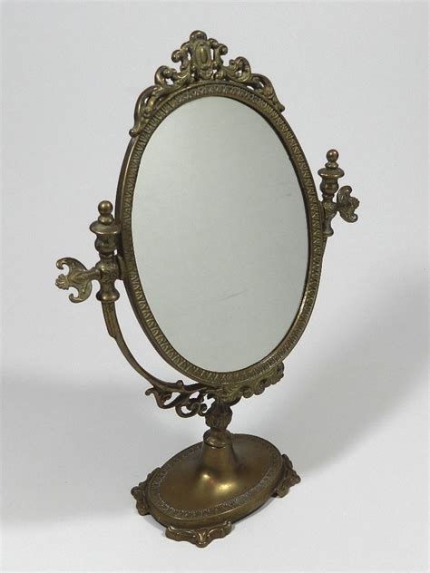 This vanity is crafted in wood with cherry oak finish was inspired by old european design with brown copper metal hardware and intricate wood carvings on the front of the two drawers. Vintage Victorian Brass Oval Swing Mirror Shaving Makeup ...